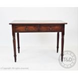 A George III mahogany side table, the rectangular top with rounded corners, raised upon tapering