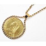 A Victorian gold double sovereign £2 piece dated 1887, within yellow metal chain mount with chain