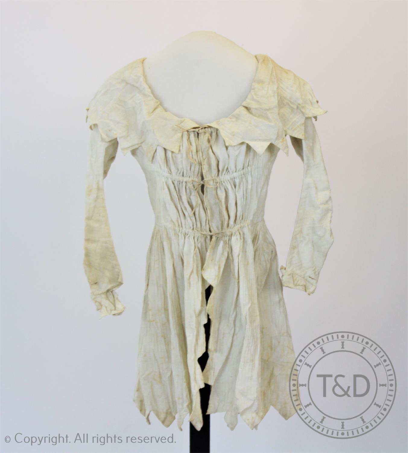 A embossed striped ivory cotton dressing jacket, circa 1795, possibly maternity, the collar and