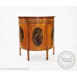 A Sheraton style painted satinwood demi-lune side cabinet, c1900, in the manner of Edwards and