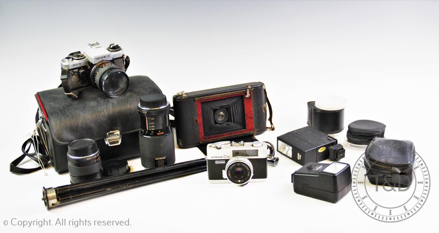 A Collection of cameras and effects to include a cased Yashica camera and lenses, Konica, a