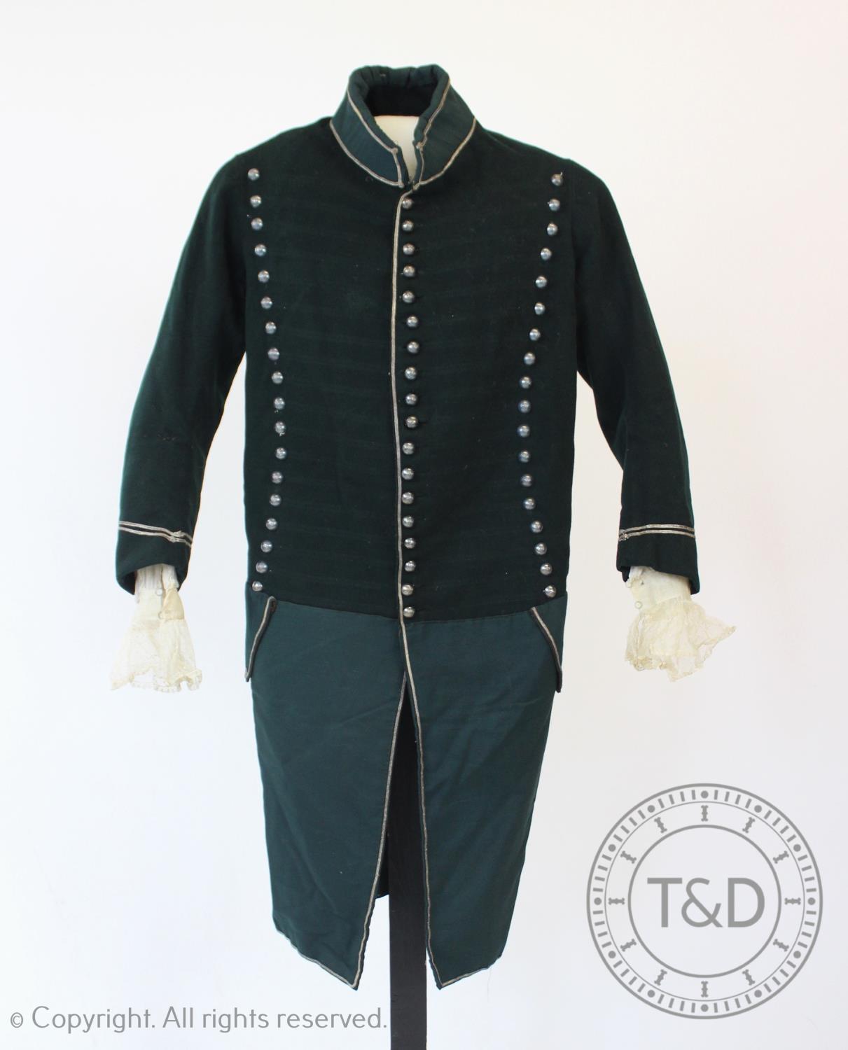 A 19th century forest green wool coat, with metal buttons stamped for Cheshire Yeomanry (RCLC), with