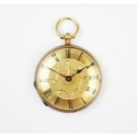 A lady's continental 18ct open face gold fob watch, the gilt face with chased detail and black Roman