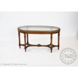 A Louis XVI style oval occasional table, with textured glass top, 52cm H x 95cm W x 42cm D