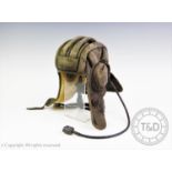 A WW2 Russian tank commanders helmet, sheepskin lined with fitted headphones and cable