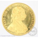 An Austrian gold ducat dated 1915, Emperor Franz Joseph I, gross weight 13.9gms