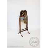 A Queen Anne style walnut cheval mirror, 131cm H x 53cm W