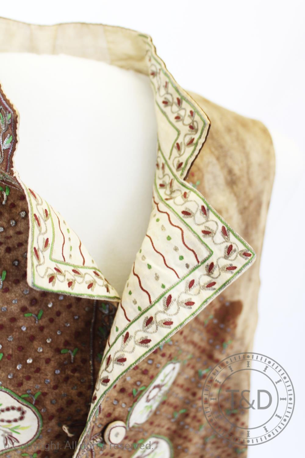 A brown metallic embroidered waistcoat, circa 1800, extensively decorated with metallic crimson - Image 3 of 4