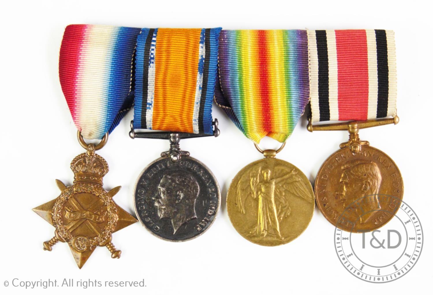 A World War I medal group awarded to Corporal J Barber Royal Engineers, comprising: 1914-15 star,