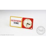 A 1970's 'Guinness Time' electric advertising clock, of easel form with rear back light, 10cm dial