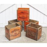 Five vintage stained pine six bottle beer crates, stamped 'Young & Co, The Ram Brewery, Wandsworth',