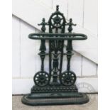 A Coalbrookdale style stick stand, the cast open work upright applied with an oval stick