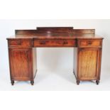 A George III mahogany sideboard, circa 1800, in the manner of Gillows of Lancaster, of inverted