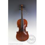 An early 20th century violin, possibly German, paper label inside reading 'ANTONIUS STRADIVARIUS