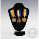 A WWI medal trio awarded to Private A.C Abbott Rifle Brigade, comprising; 1914-15 star, War and