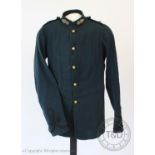 A Royal Artillery fine wool jacket with brass buttons and braided detail and another military