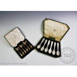 A set of six mother of pearl caviar spoons, each 12cm long, to a Fenton Russel & Co Ltd fitted