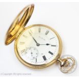 A 14ct gold full hunter Elgin pocket watch, the white enamel dial with black Roman numerals,