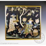 A late 19th century Chinese silk work panel, depicting a figure presenting an ivory pagoda, a dog of
