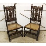 A pair of Victorian Carolean style oak hall chairs , with a pair of acorn shaped finials above a