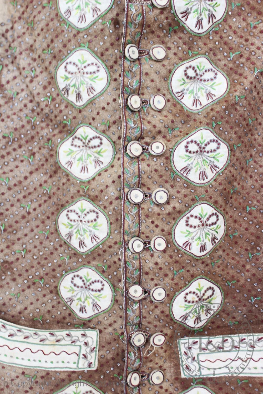 A brown metallic embroidered waistcoat, circa 1800, extensively decorated with metallic crimson - Image 2 of 4