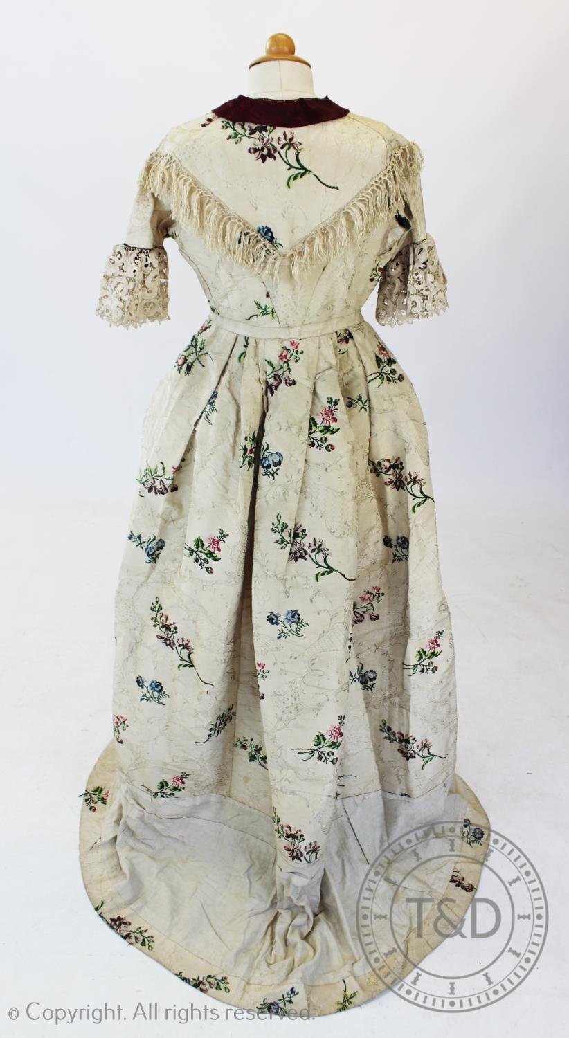 A Spitalfield silk dress, circa 1760's, the ivory silk with woven rococo design with sprays of - Image 6 of 6