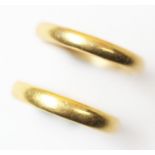 A pair of 22ct yellow gold wedding bands, hallmarked to inside shanks, gross weight of pair 9.