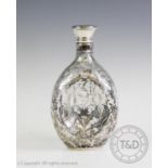A 20th century white metal topped dimple whiskey decanter, John Haig & Co Ltd, designed with a