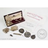 A selection of silver and silver coloured items to include, a silver gilt rabbit charm, London 1992,