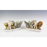 A pair of Sitzendorf bisque glazed porcelain lion-drawn chariots, one modelled with a lion, the