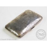 A Victorian silver cigar case George Unite & Sons, Birmingham 1893, swirling foliate decoration,