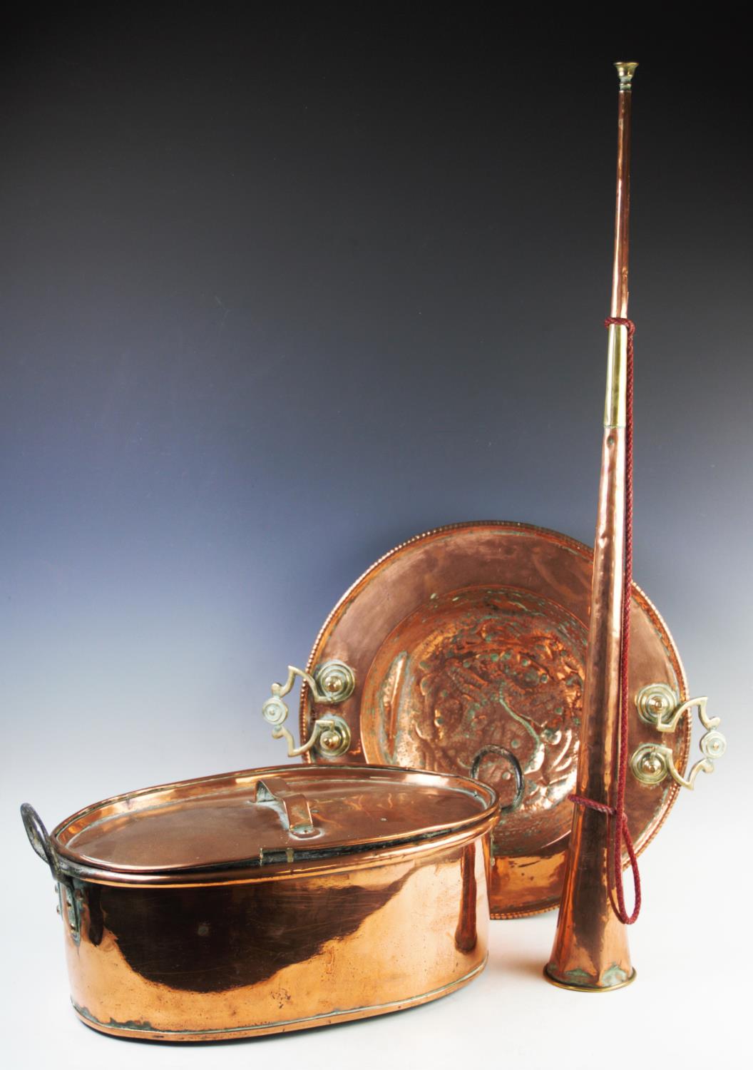 A copper and brass brazier, 19th century, the circular brazier with beaten dished centre,