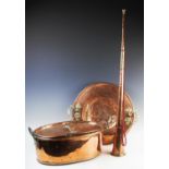 A copper and brass brazier, 19th century, the circular brazier with beaten dished centre,