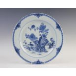 A Chinese 18th century porcelain blue and white charger, of circular form decorated with a peacock
