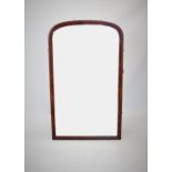 A large Victorian mahogany arched wall mirror, with a moulded frame, 162cm x 97cm