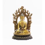 A model of Bodhisattva Bhaishajyaguru, modelled seated in dhyanasana, 26cm high