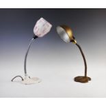 Two early 20th century adjustable desk lamps, the first with a painted cast metal base extending
