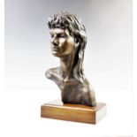 A modern bronze type sculptural bust, modeled as a young woman, signed 'John Pooler' verso, on a