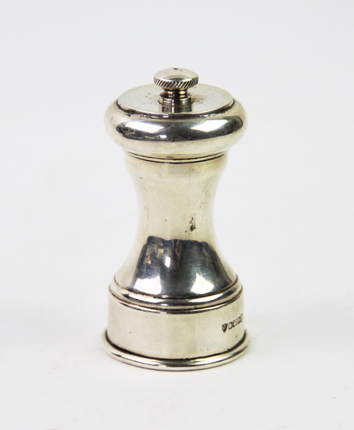 A silver pepper grinder, J B Chatterley & Sons Ltd, Sheffield 1977, of typical form with plain