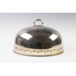 A silver plated domed food cover, early 20th century,with a fixed reeded loop handle and a chased