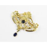 A Belle Epoque sapphire and diamond set brooch, the yellow metal garland form brooch set with a