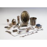 A selection of silver and silver coloured wares, to include; a Chester silver match sleeve, a