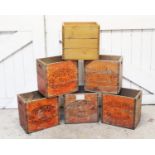 Six vintage stained pine six bottle beer crates, stamped 'Young & Co, The Ram Brewery,Wandsworth',