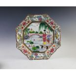 A Chinese Canton porcelain famille rose octagonal charger, circa 1900, decorated with a central