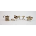 A selection of continental silver, comprising: a Victorian imported silver cream jug, London 1894,