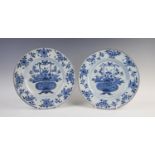 A pair of Chinese 18th century porcelain blue and white wall plates, each of circular form and