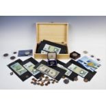 A collection of coins and bank notes to include Bank of Scotland, Bank of England £1 notes, a