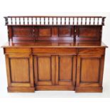 A 19th century mahogany sideboard, the architectural raised back with a spindle gallery above a