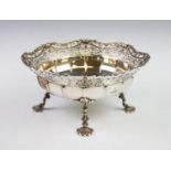 A George V silver dish, Adie Brothers Ltd, Chester 1935, with cusped and pierced rim, the plain