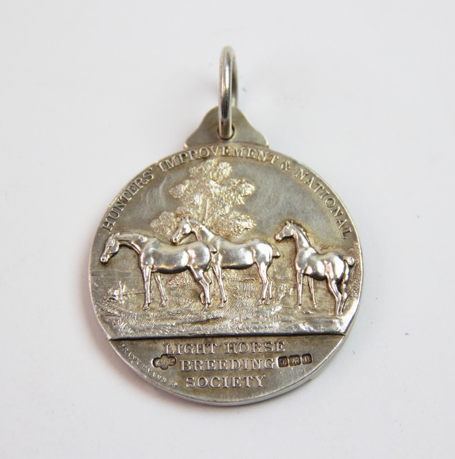 A George V silver medal, Frank Hyams Ltd, Birmingham 1912, inscribed 'Hunters Improvement & - Image 2 of 2